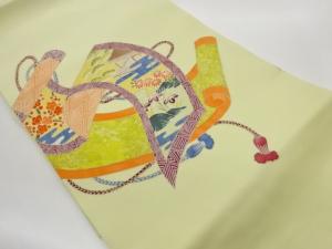 塩瀬金彩巻物にヱ霞・草花模様名古屋帯